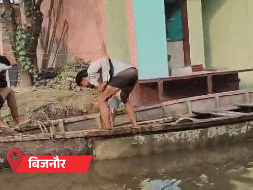यूपी के 10 शहरों में तेज बारिश, बिजनौर में बाढ़:हाईवे बंद, सड़कों पर नाव चली; आज सभी 75 जिलों में बरसात का अलर्ट